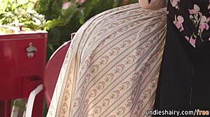 hey, check this sensual blonde licking her redhead friend's hairy pussy outdoors 😏