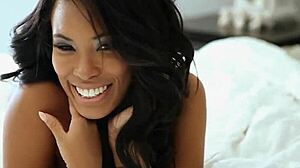 Hey, check out ebony milf model Leola Bell stripping to show her amazing big tits and shaved pussy curves.