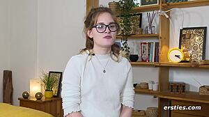 ersties luna uses dildo and vibrator on shaved pussy with glasses and piercing in solo masturbation