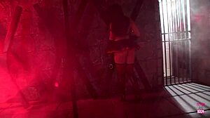 A brunette ties a guy up and jumps on his dick and on his strapon