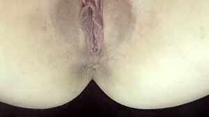 Horny girl gets so wet playing with her dripping pussy while watching intense bbc porn action.
