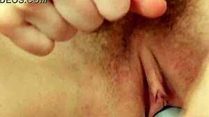 Brunette milf mom spreads legs in stockings for pussy fingering and anal play on bed!