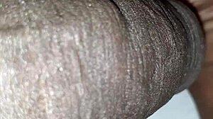 Why does this man play with his huge black monster cock in close-up view?