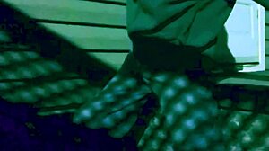 Skinny amateur stretches in leggings at night, creating intriguing lattice shadows on ass and legs during homemade workout.