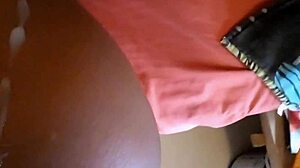 Hey, this squirting ebony babe gets fucked doggy style by her friend, covering tits in cum.