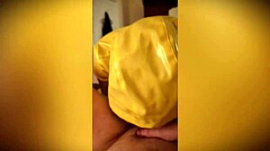 I found this little yellow raincoat with hood and rubber boots.