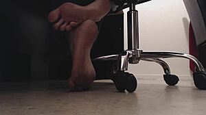 Foot voyeur sneaks peeks at tall mistress's dirty soles and crunching toes underdesk.
