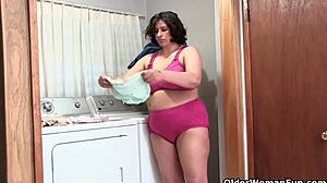 Lactating granny boldly drinks her milk and masturbates with big tits in housewife solo action