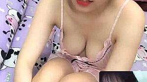 This beauty flaunts her massive tits in wild action.