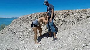 Hey, check out this thick babe giving public beach blowjob with big tits