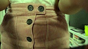 Girl plays with balloons while wearing pantyhose, big tits bouncing.