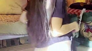 brunette beauty strips slowly in stockings for solo tease