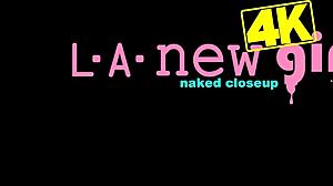 Picture-perfect brunette teen poses on sofa to reveal her sexy petite body during photoshoot.