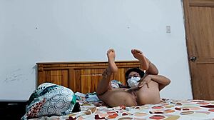 My mother-in-law slowly undresses to reveal her wide-open pussy.