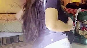 brunette beauty strips slowly in stockings for solo tease