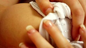 innocent-looking beauty shows off her naughty bedtime secret with soft moans