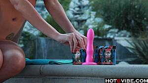 big titted blonde gives herself orgasms by the pool