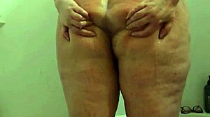 I spy on voyeur candid BBW milf getting soaking wet in shower with hidden cam