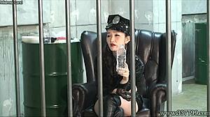 prisoner, feel my dominance as i manage your ejaculation, says the woman guard