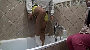 Stepmom spies stepson scrubbing dirty monster cock in shower