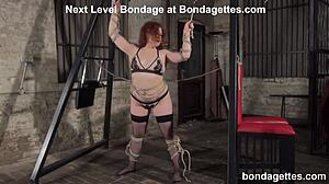 isabel squirms in tight bondage as experienced mistress ties her chubby belly in latex