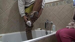 Stepmom spies stepson scrubbing dirty monster cock in shower