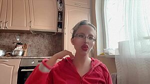 Fetish girl poses with huge kinky glasses long nails