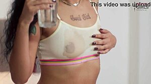 A young curly-haired girl trades virtual sex cash for her shiny new headphones