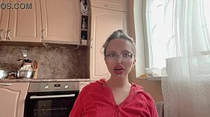 Fetish girl poses with huge kinky glasses long nails