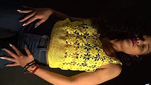 Her hips sway rhythmically ass shaking in sexy outfit long nails gleaming