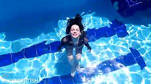 Latex-Clad Jessica Bunny Dives Underwater in Pool