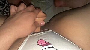 latina shoves dildo through wet panties into big pussy lips closeup