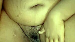 watch this ebony stepmom rub her wet hairy pussy clit to orgasm