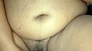 watch this ebony stepmom rub her wet hairy pussy clit to orgasm