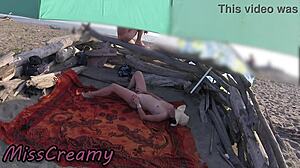 wanna see my teacher flash n rub her wet pussy for beach voyeurs?