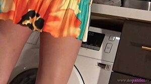 hot brunette babe kitchen tease panties bra miniskirt shaved pussy reveal voyeur underwear strip 😏🔥