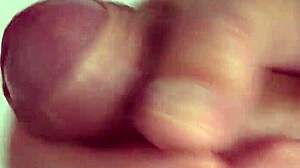 She fingers her wet pussy up close in solo tease