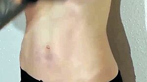 submissive redhead bound to machine squirts from rough whipping clamps