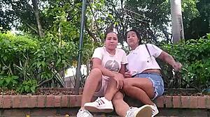 Two horny colombian lesbians finger wet pussies in public park