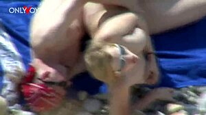 A voyeur spots juicy white girl ass fucked doggystyle on beach then creampied publicly with tan lines flashing plump tits
