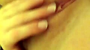 Blonde teases shaved pussy to vibrator bliss