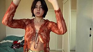 skinny tattooed teen slut tries on skimpy skirts and tops seductively