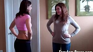 sarah and cherry carry each other in femdom cum play