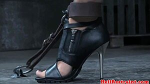 Breastbondage sub restrained punished on bdsm sex machine close-up gagging heels