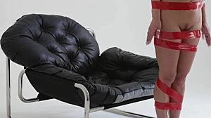 i'm tied up helpless as this blonde playboy babe gets bound in red tape backstage