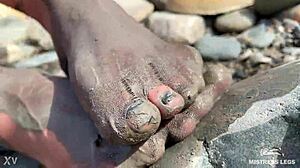 goddess's torn pantyhose reveal messy nylon feet by river closeups