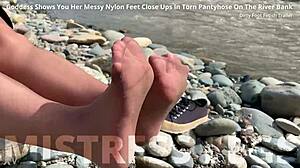 goddess's torn pantyhose reveal messy nylon feet by river closeups