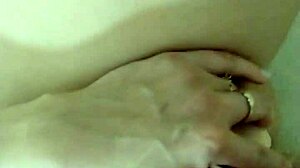 brunette teen masturbates wet pussy in shower