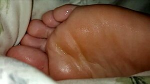 Girlfriend's toes get licked and sucked in intimate foot worship session